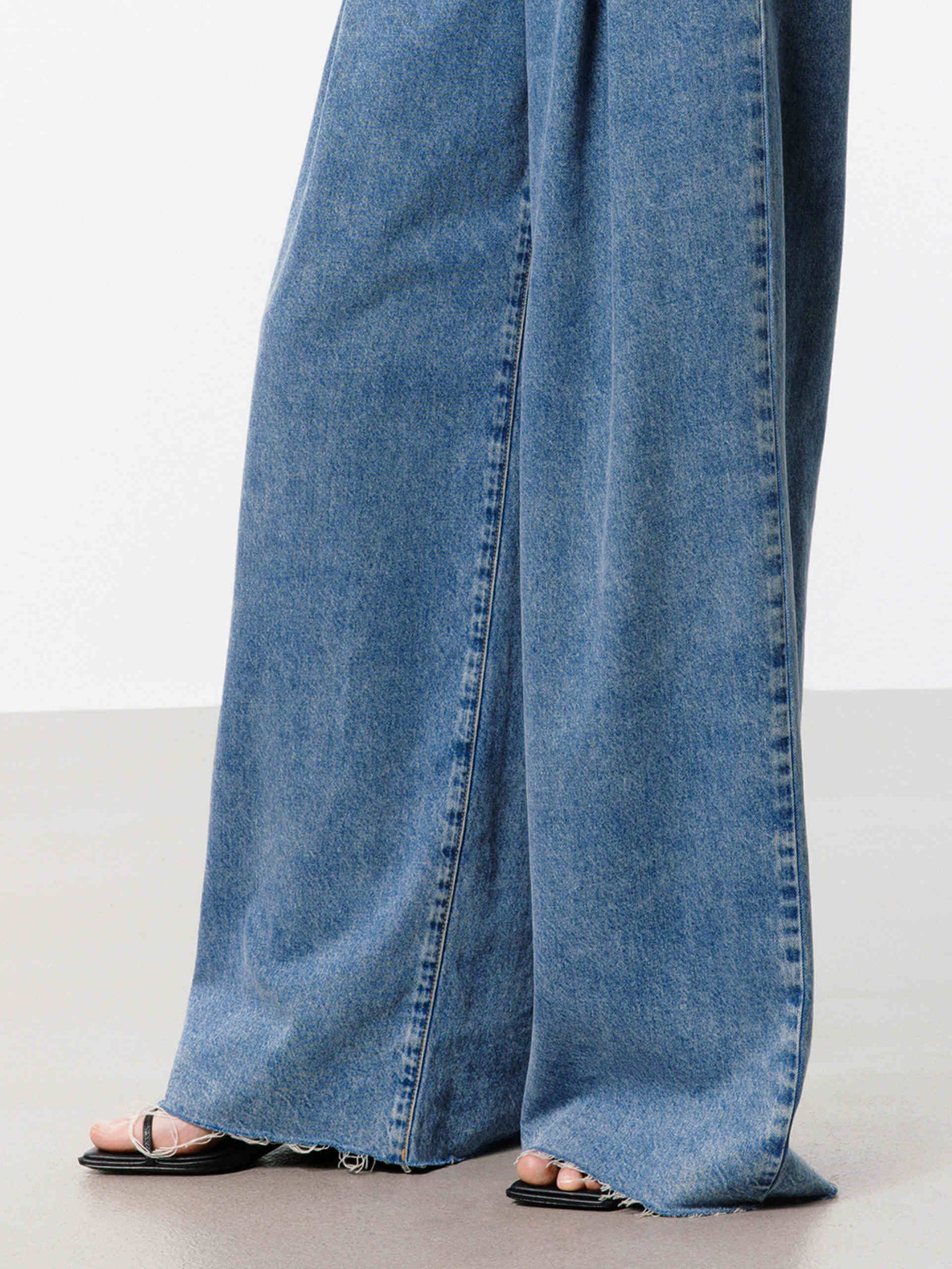 MO&Co. Women's Pleated Wide Leg Jeans in Blue with Belt Details