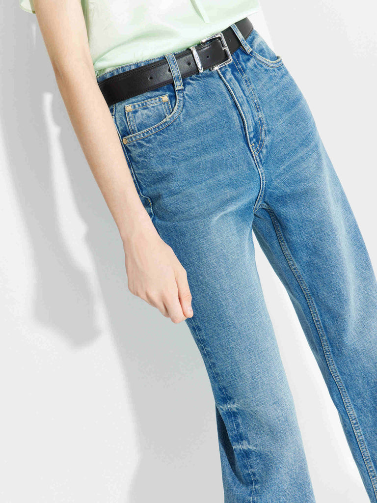 MO&Co. Women's Mid Waist Straight Whiskered Jeans in Blue features a secure button and zip closure, roomy five-pocket design, and easy accessorizing via the belt loops.