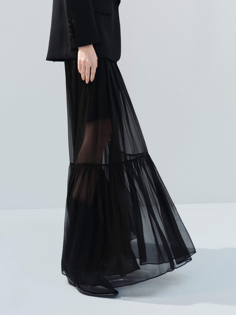 MO&Co. Noir Women's Elasticated Waist Black Silk Maxi A-line Skirt. Crafted from soft silk, this skirt boasts a flattering maxi cut with distinct pleats and gathers that add texture and movement to your look.