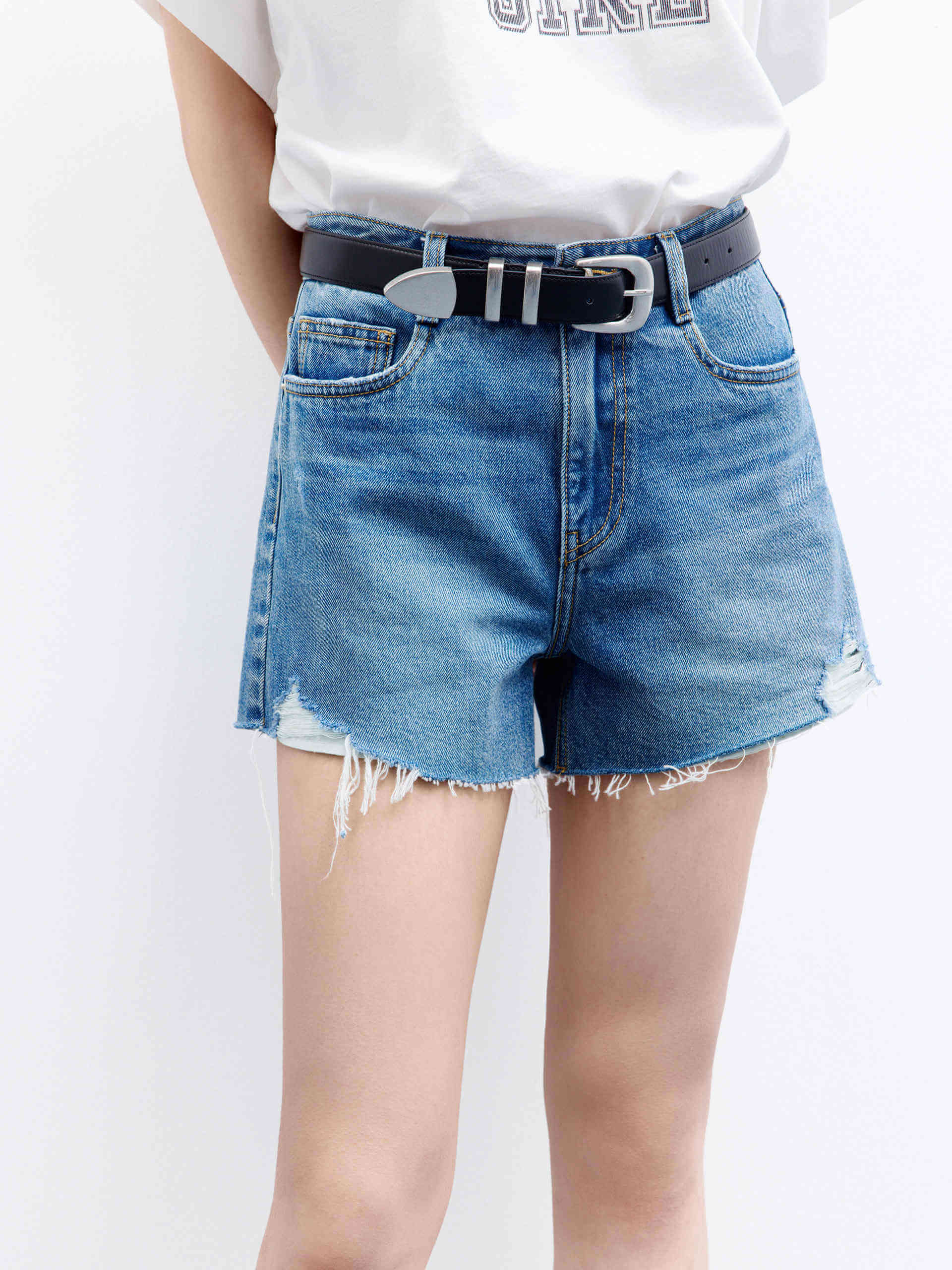 MO&Co. Women's Mid-rise Raw Hem Cotton Denim Shorts in Blue