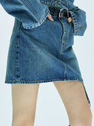 MO&Co. X Coperni Collection | Women's Asymmetric Denim Mini Skirt in Blue