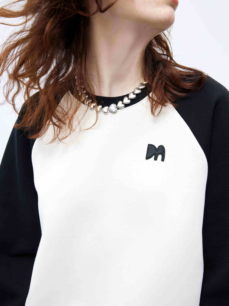 MO&Co. Women's Two Tone Crew Neck Raglan Sleeve Logo Sweatshirt