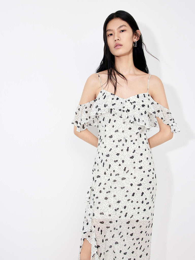 MO&Co. Women's Polka Dot Tulle Slip Dress in White features eye-catching frill details, floral/polka-dot print, adjustable straps and a front slit combine to make a stand-out look for your wardrobe.