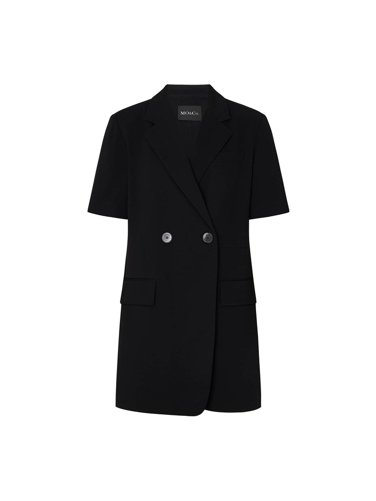 MO&Co. Women's V Neck Acetate Blend Blazer Romper in Black. Its double-breasted design provides a timeless silhouette, while its relaxed fit and V-neck complements your figure.