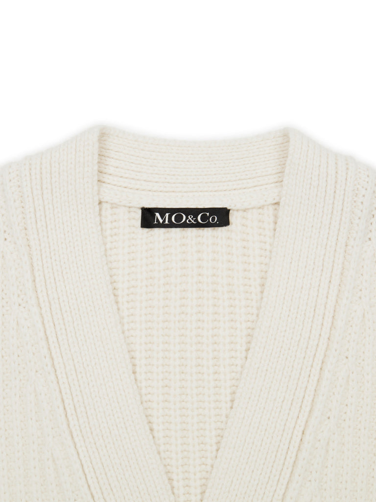 MO&Co. Women's Solid Dual Pocket Ribbed Knit Cardigan Loose Chic Beige Cardigan
