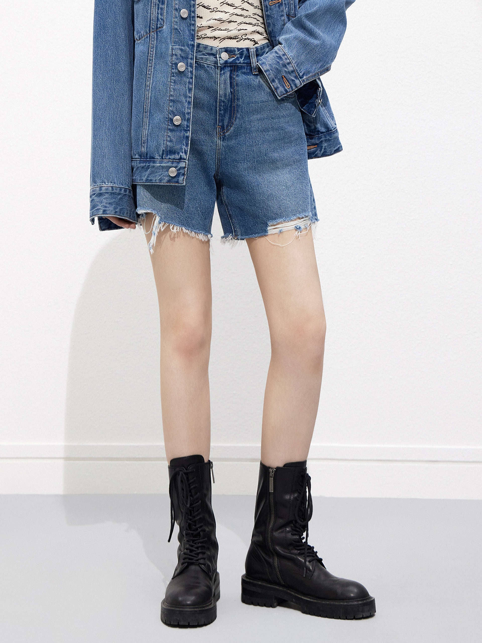 Women's Destroyed Hem Mid-rise Blue Denim Shorts