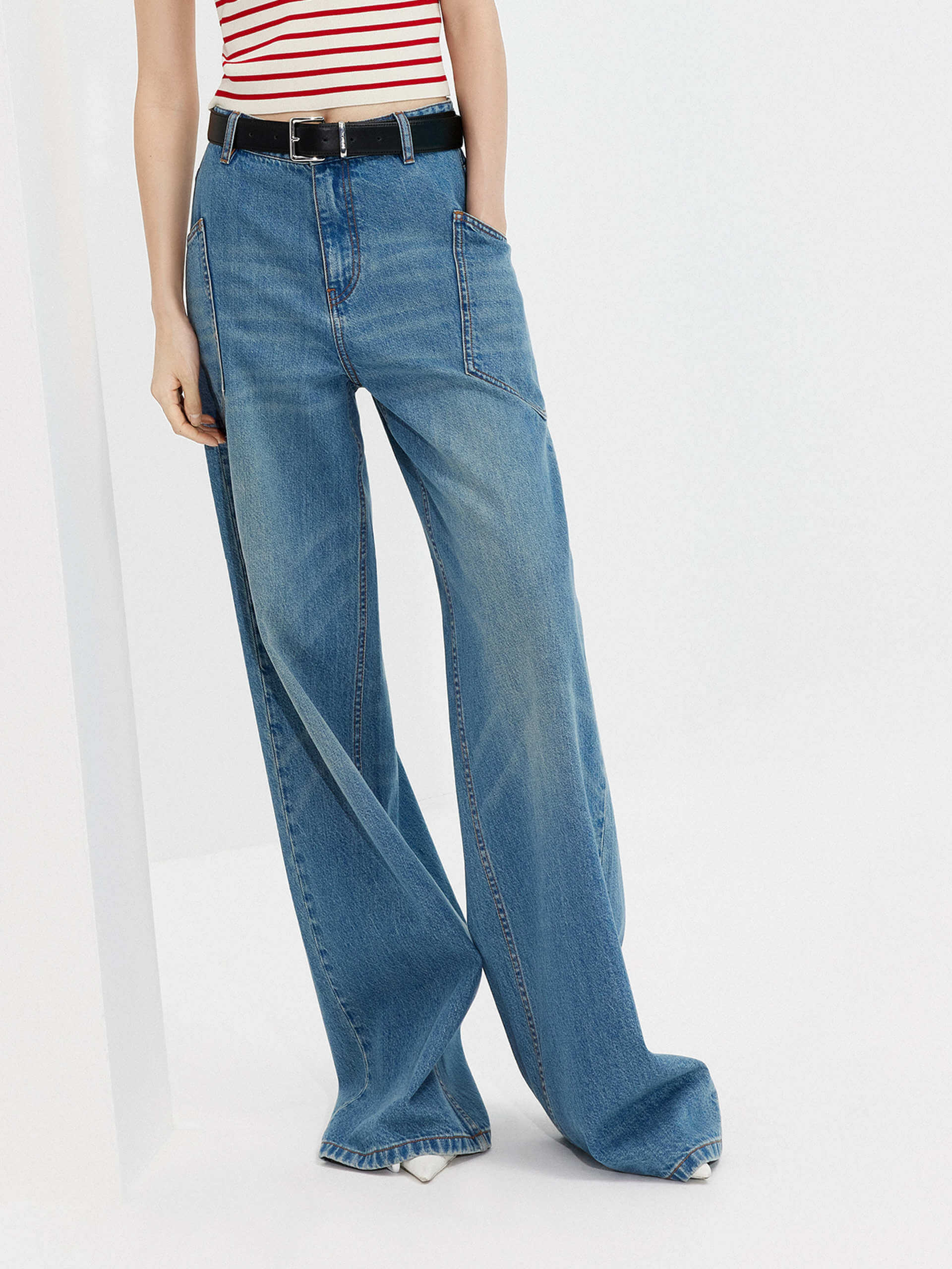 MO&Co.'s Women's Wide Leg Full Length Jeans - crafted from 100% cotton with comfort and soft touch, featuring a button and zip closure, whiskered effect and big side pocket details.