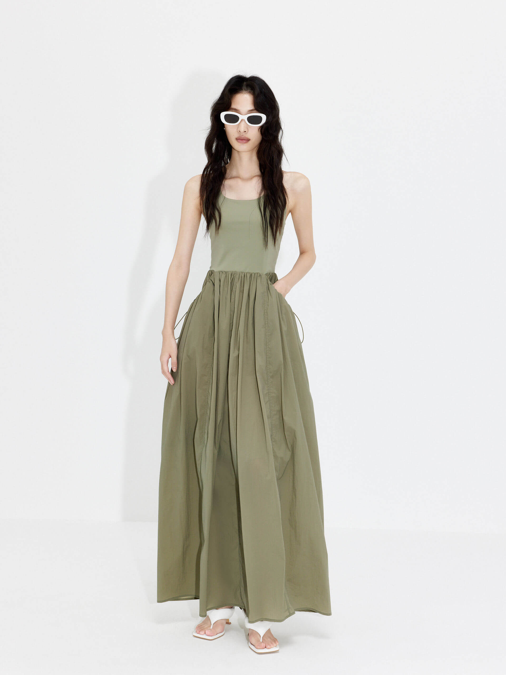 MO&Co. Women's Athleisure Contrast Panel Cutout Dress in Olive features sleeveless, racerback silhouette and maxi length.