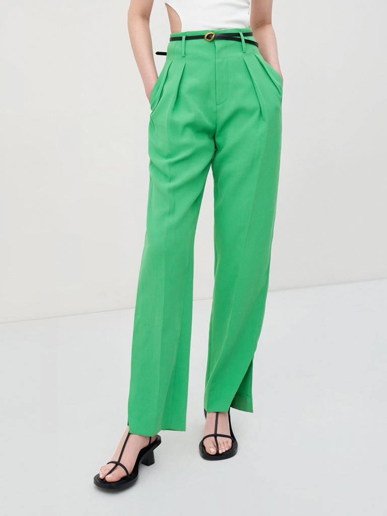 MO&Co. Women's Pleated Suit Pants with Belt in Green features high-rise, slit detail at hems, straight leg fit.