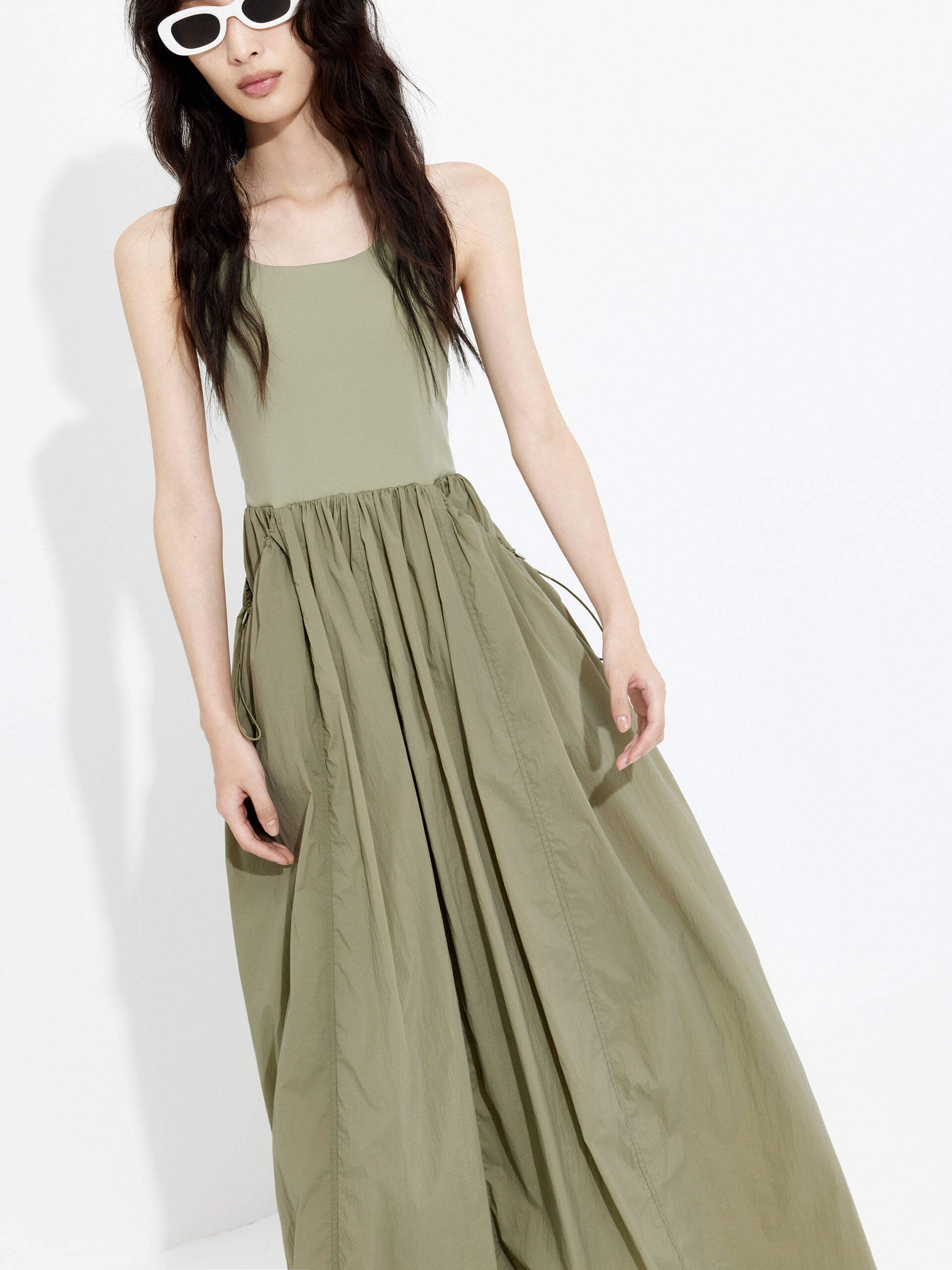 MO&Co. Women's Athleisure Contrast Panel Cutout Dress in Olive features sleeveless, racerback silhouette and maxi length.