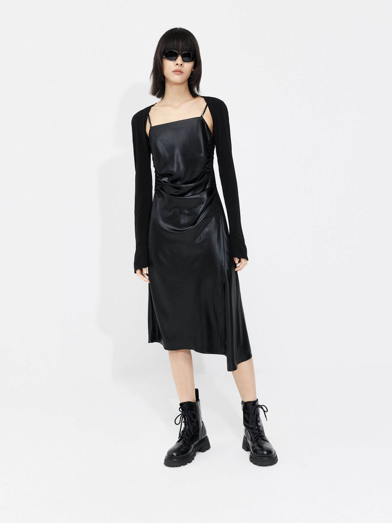 MO&Co. Women's Triacetate Blend Dress Set in Black Featuring a breathable, soft fabric with adjustable spaghetti straps, a removable metallic chain, and an asymmetrical hem bolero top, you can be sure to make a statement. 