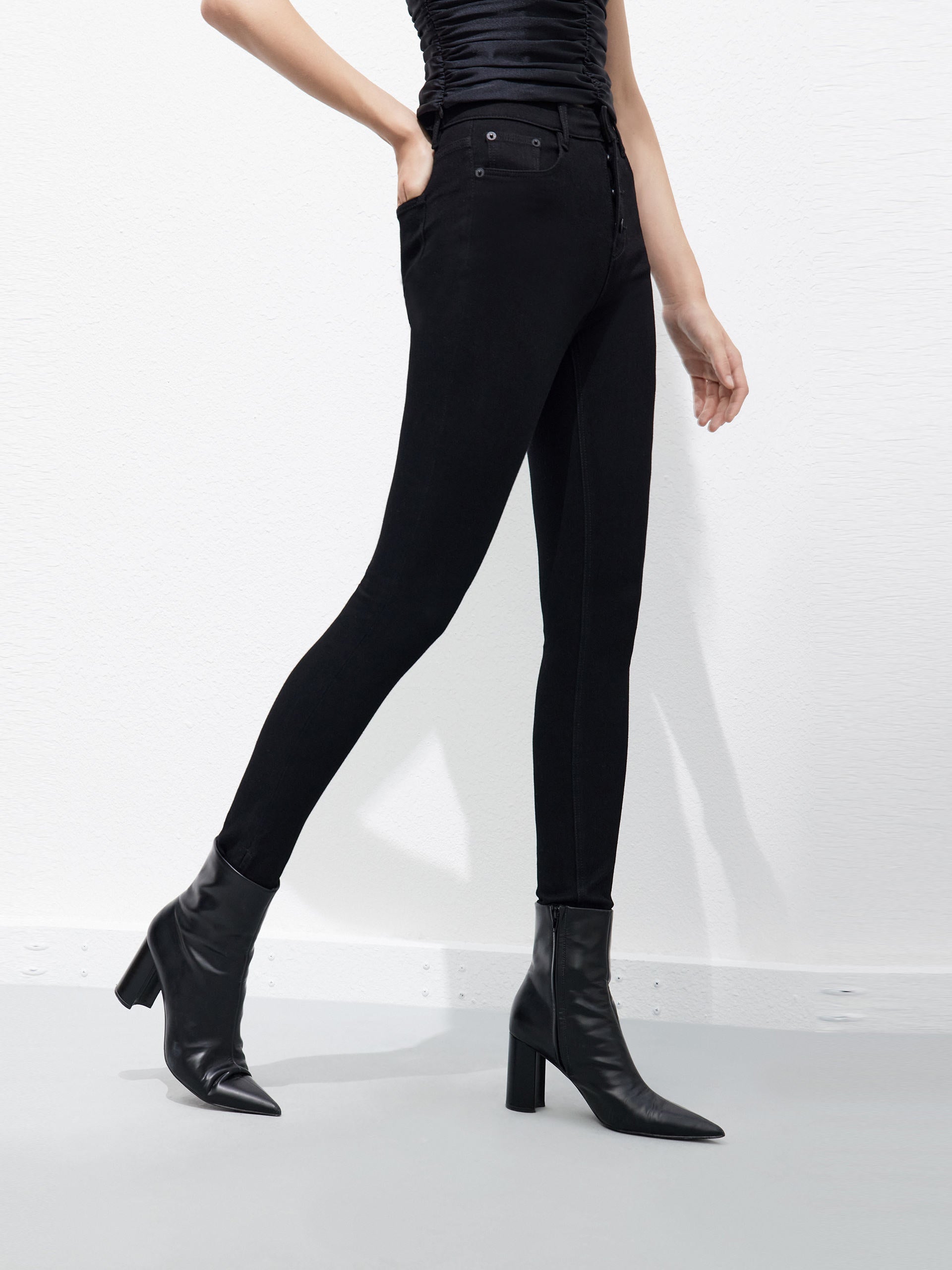 Slit High Rise Jeans in Black Skinny Jeans