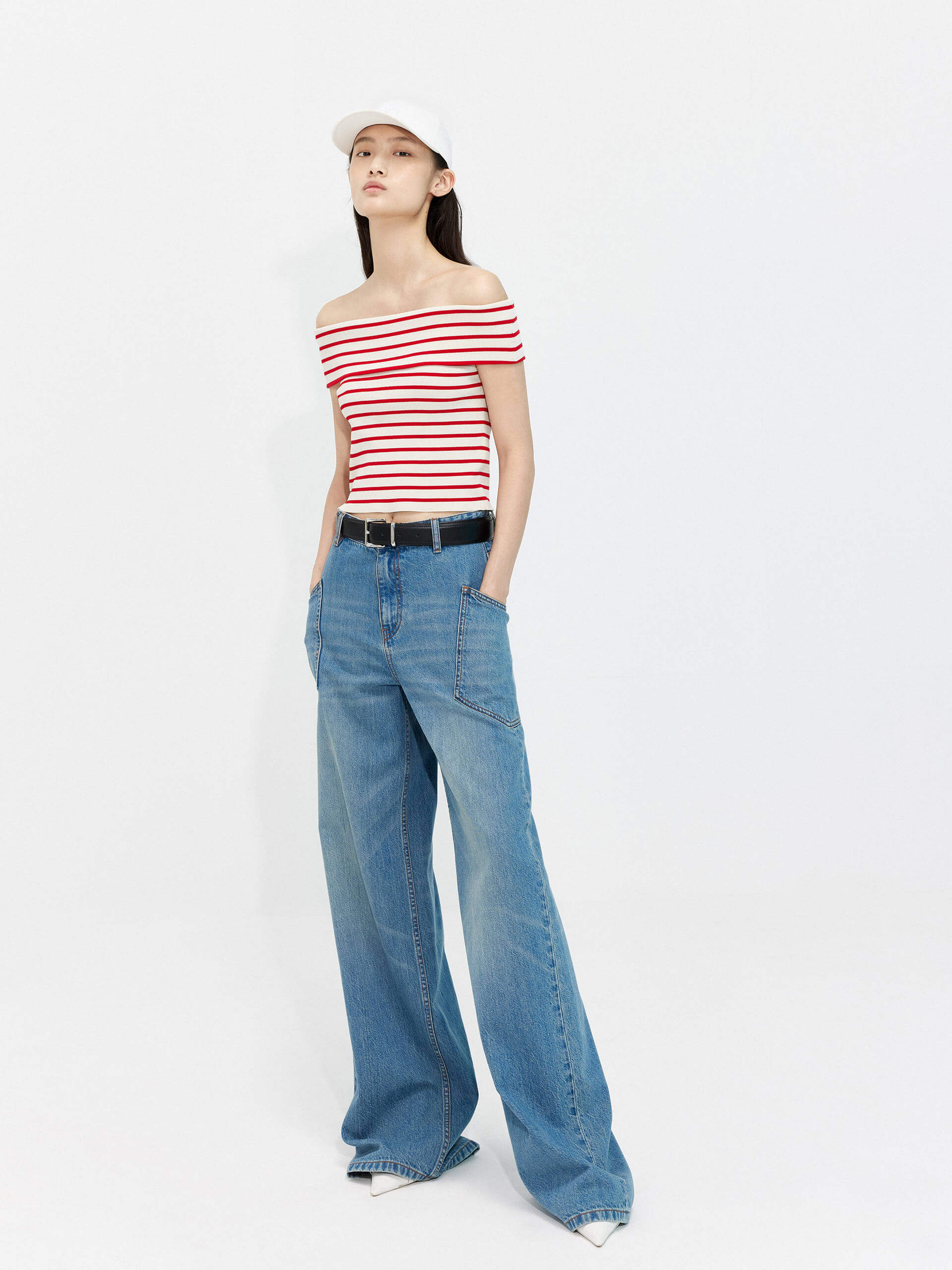 MO&Co.'s Women's Wide Leg Full Length Jeans - crafted from 100% cotton with comfort and soft touch, featuring a button and zip closure, whiskered effect and big side pocket details.