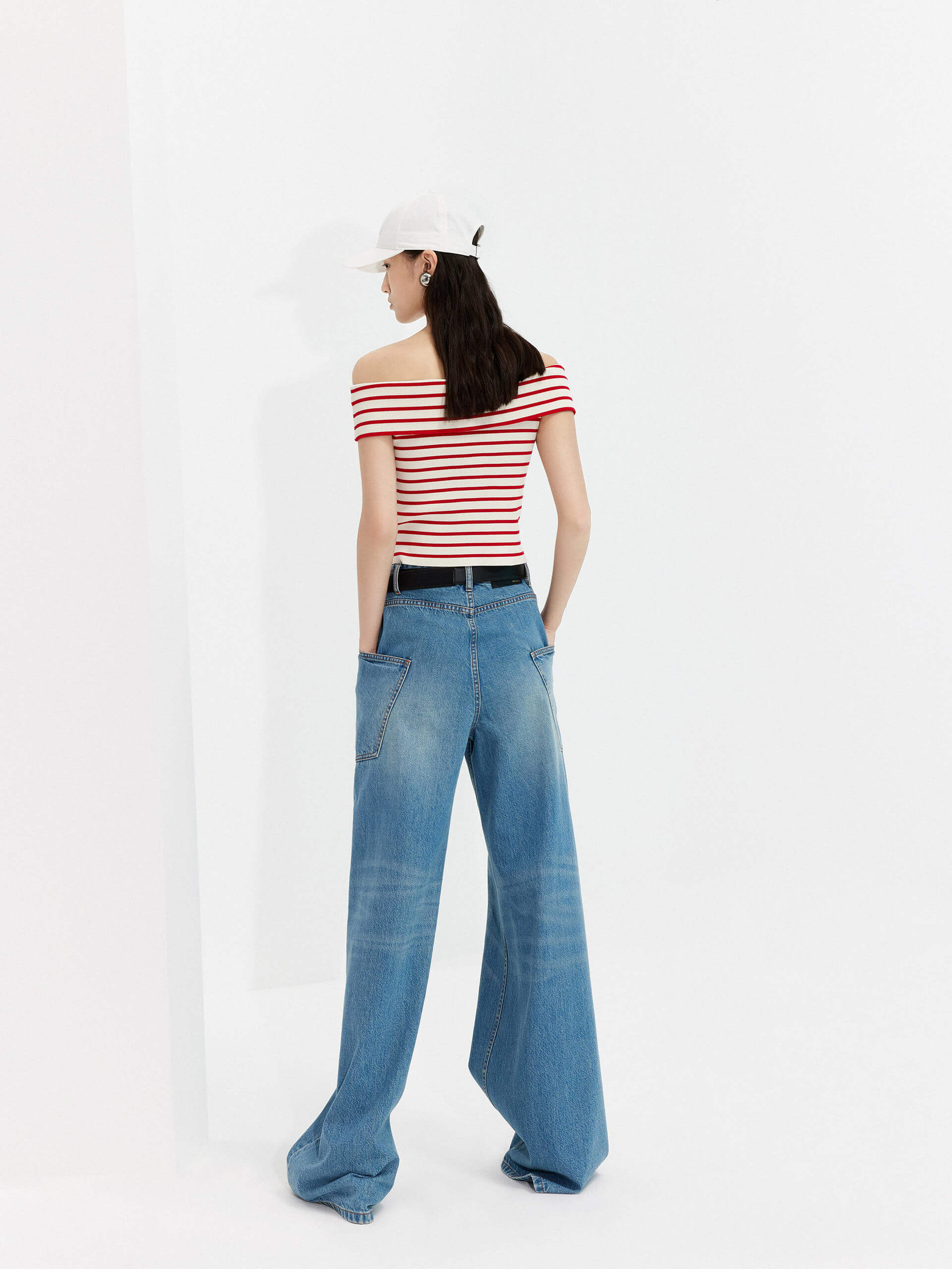 MO&Co.'s Women's Wide Leg Full Length Jeans - crafted from 100% cotton with comfort and soft touch, featuring a button and zip closure, whiskered effect and big side pocket details.