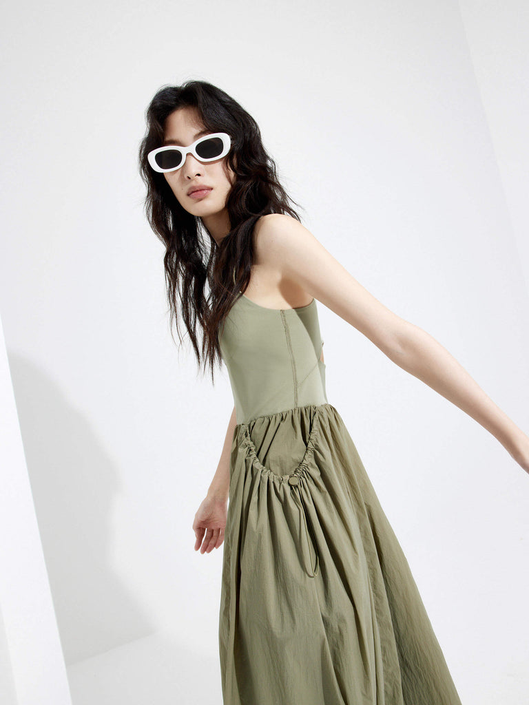 MO&Co. Women's Athleisure Contrast Panel Cutout Dress in Olive features sleeveless, racerback silhouette and maxi length.