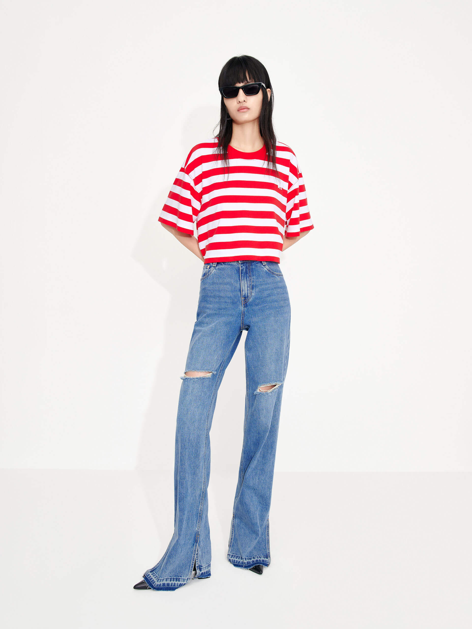 MO&Co. Women's Cropped Stripe Cotton T-shirt for summer casual days. Features a cropped, relaxed fit and classic red and white stripes