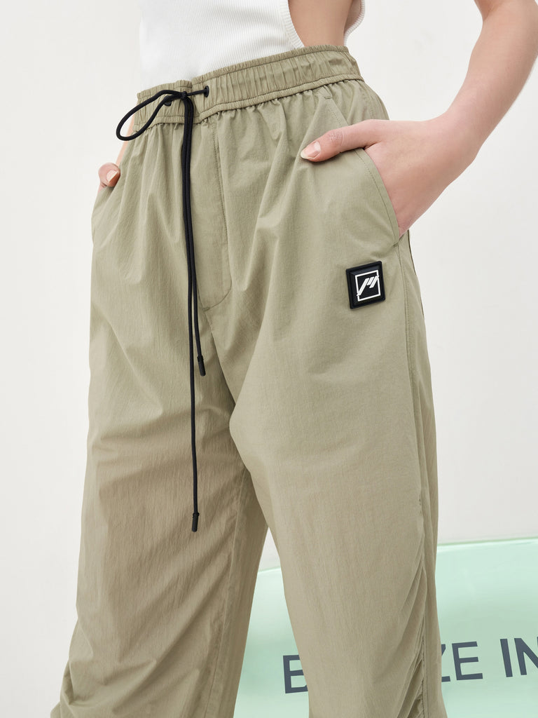 Women's Drawstring Side Pleated Parachute Pants in Olive